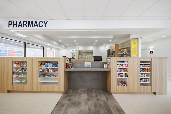 Pharmacy counter under a PHARMACY bulkhead