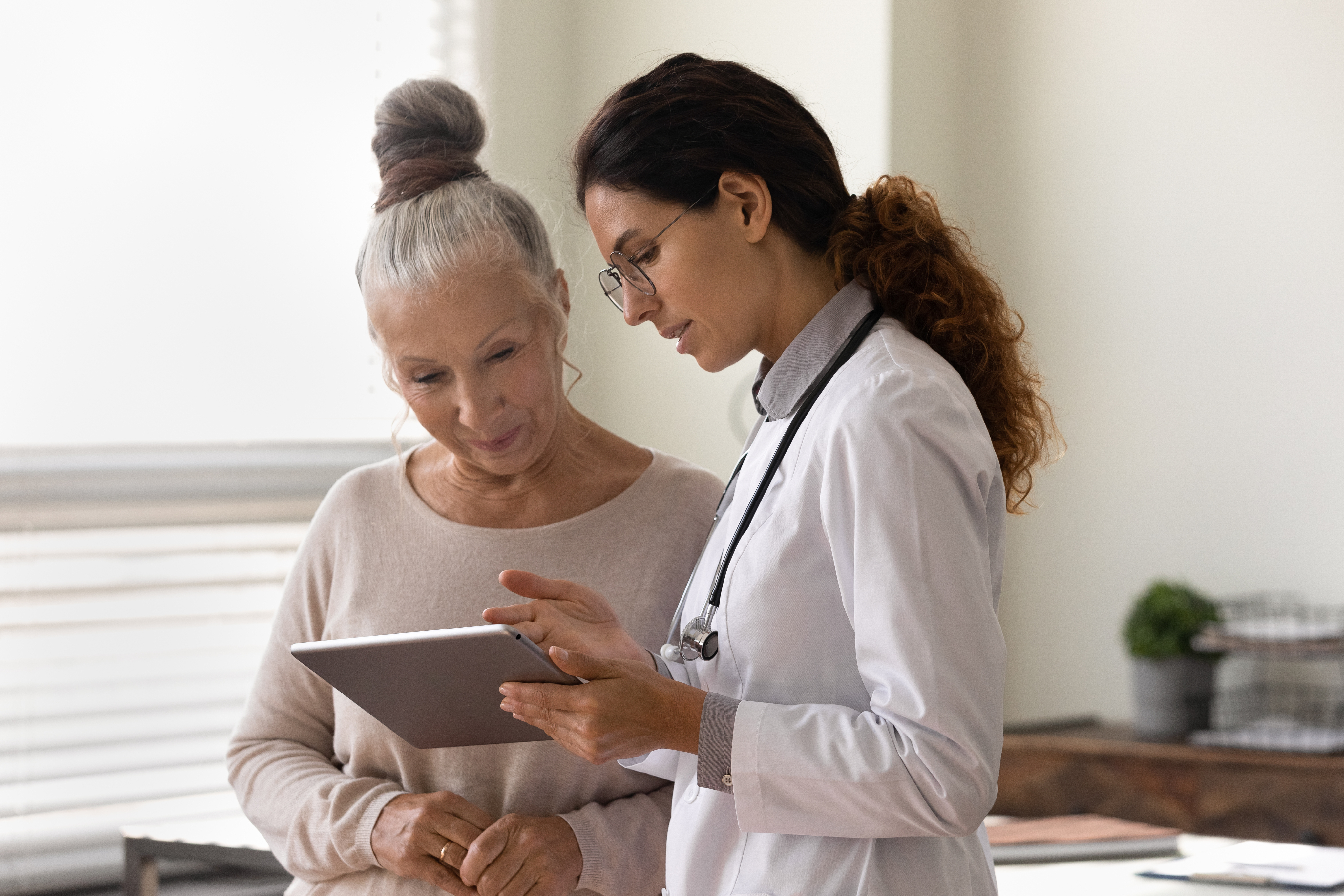 A clinician reviewing a care plan with a patient